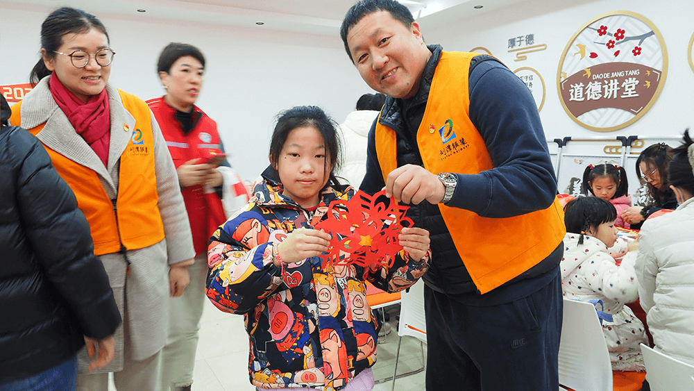 劉潭服裝參加社區(qū)迎新春活動