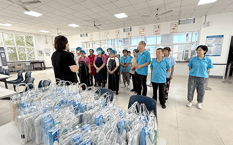 劉潭服裝：雙重關(guān)懷護“后方” 清涼安全送食堂